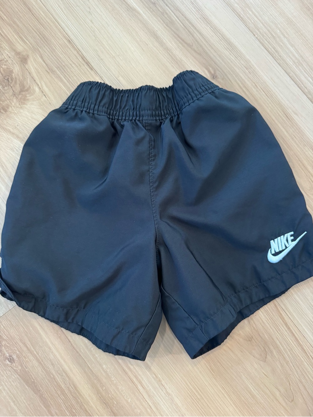 Nike Black Kids Athletic Shorts with White Swoosh
